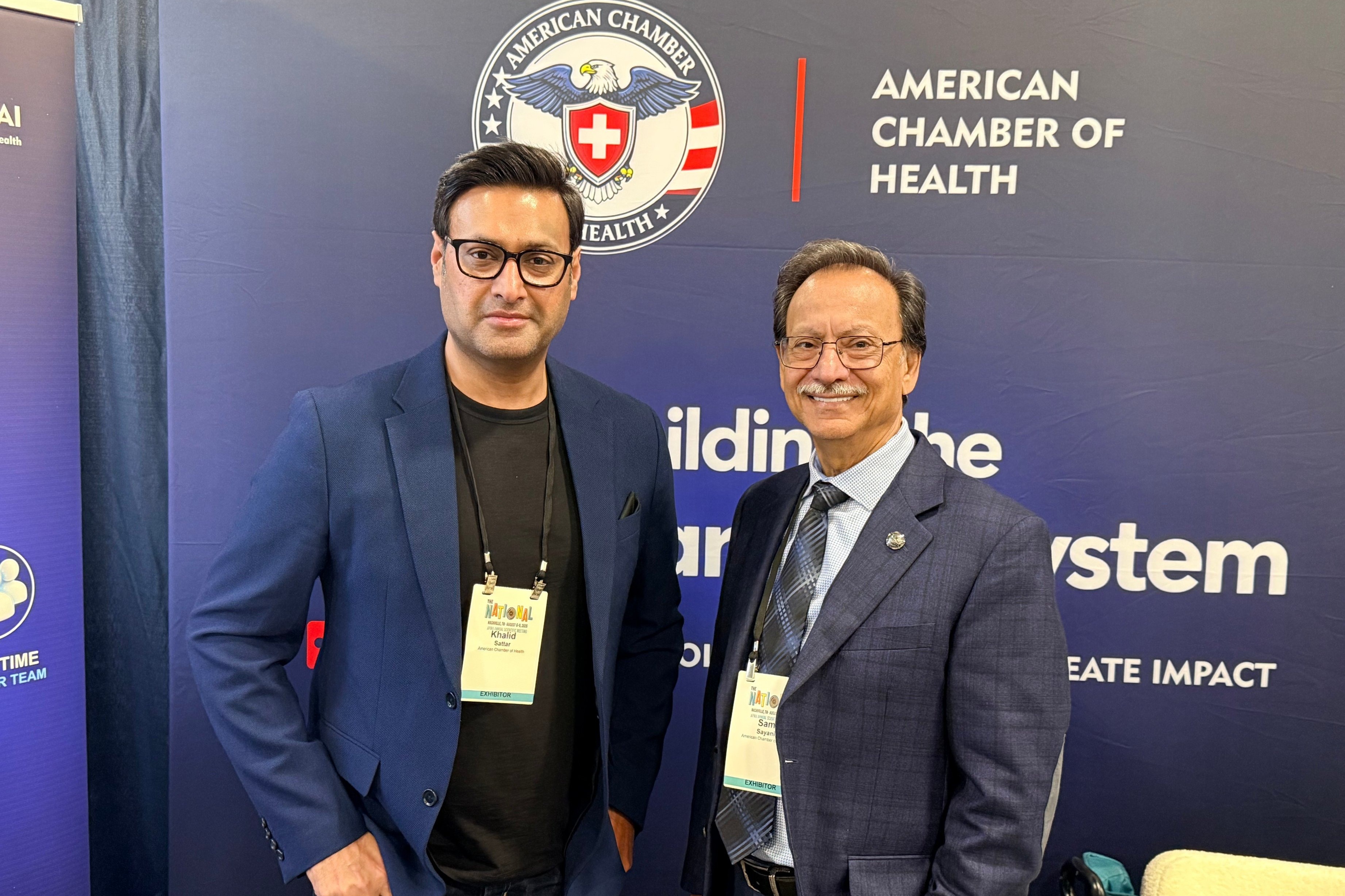 Khalid Sattar and Sam at the ACH booth during The National