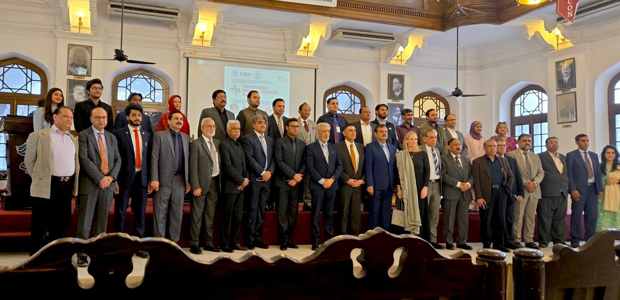 Delegates pose for a group photo in the summit hall during the Medical Tourism Conference at KEMU