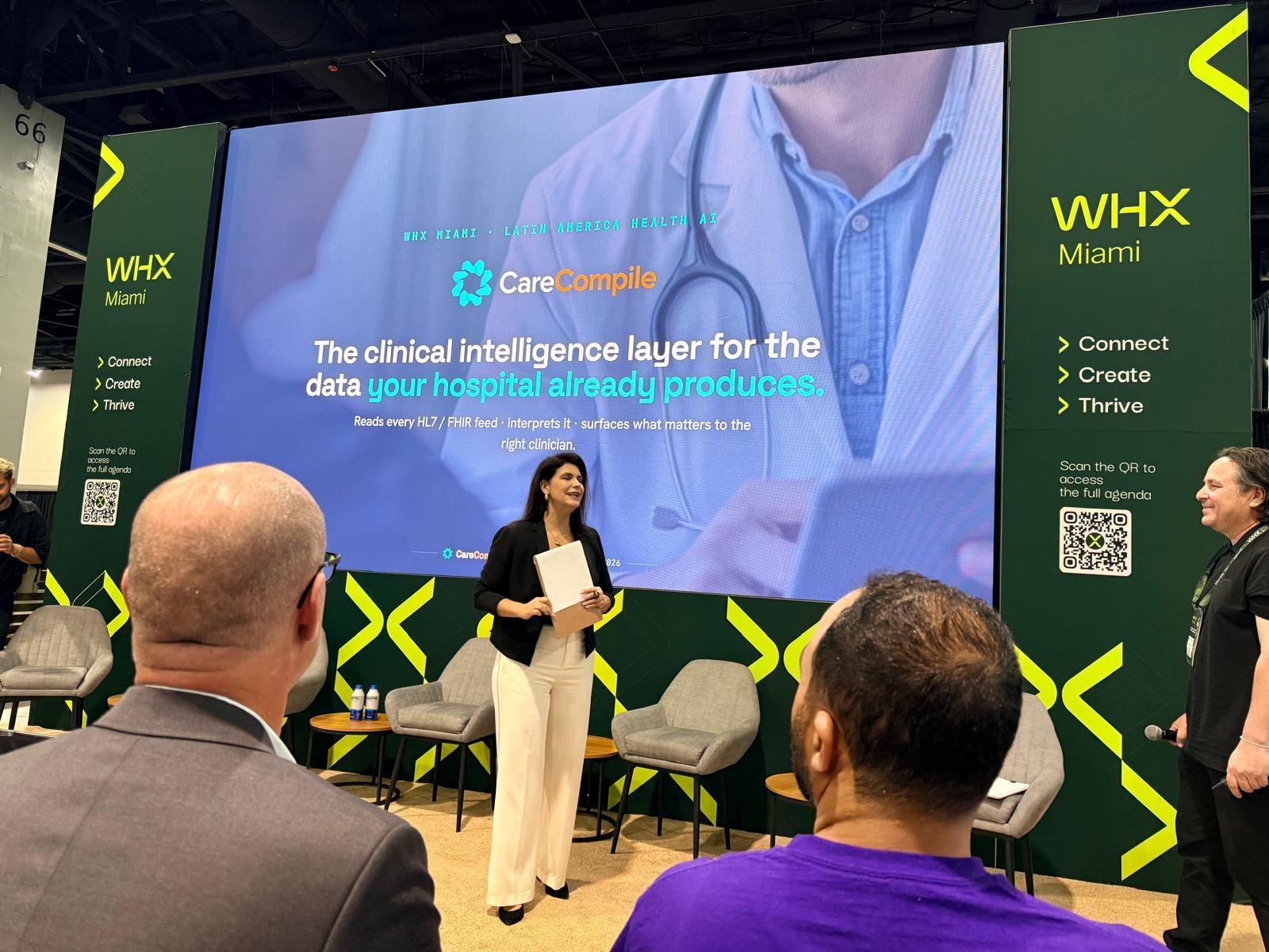 A presenter introduces CareCompile on the Future X Stage at WHX Miami