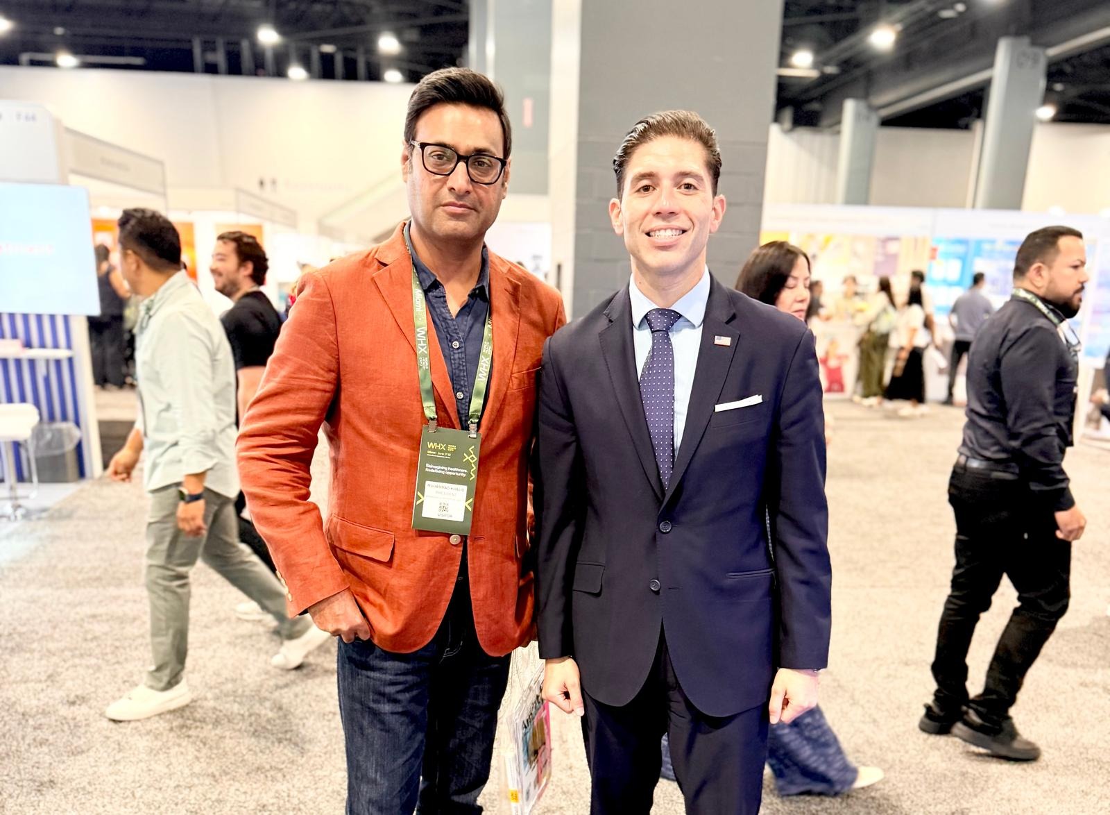 Khalid Sattar with Commissioner Roberto J. Gonzalez on the expo floor at WHX Miami
