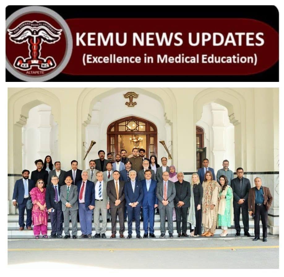 Delegates gather for a group photo on the steps of the KEMU building in Lahore